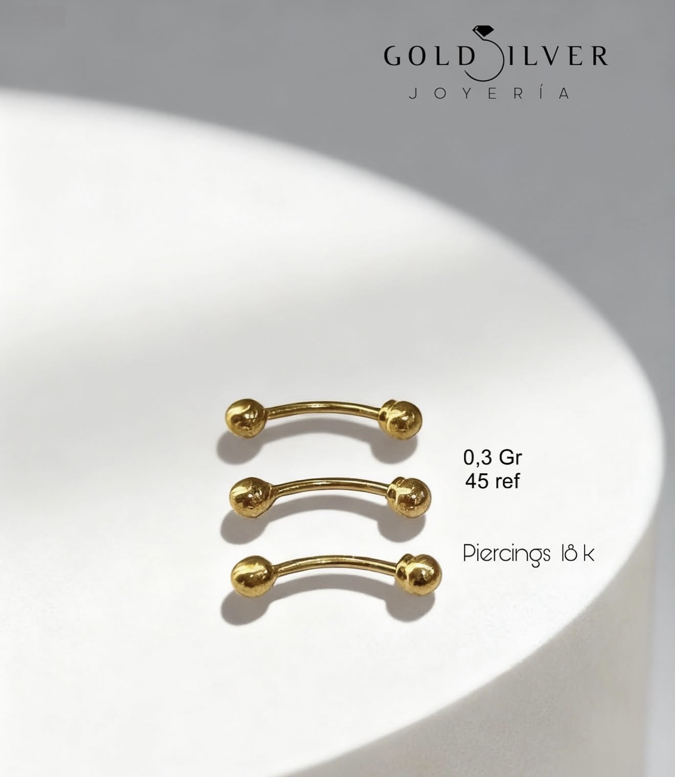 Piercing Curvo con Bolas en Oro 18K